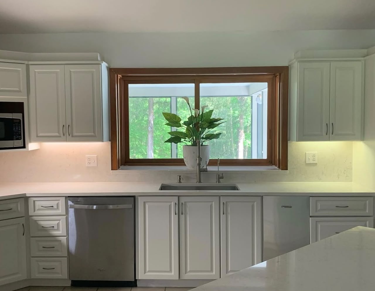 White kitchen with window over sink